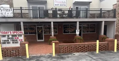 The Den Jamaican.